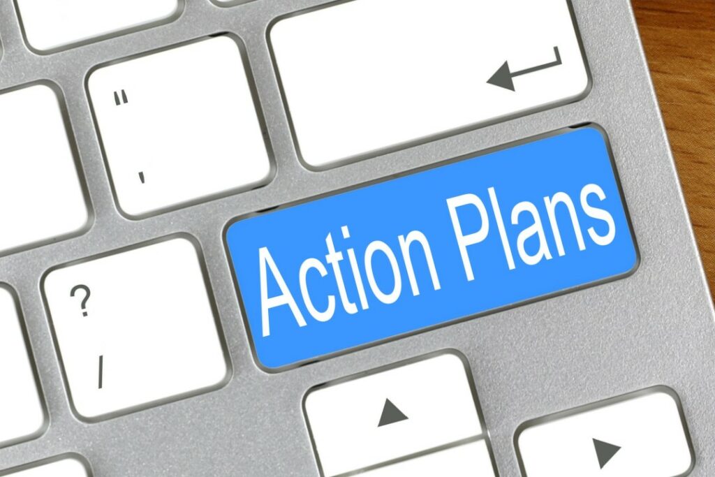 keyboard with a blue button that says Action Plans